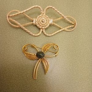 Two separate vintage pins